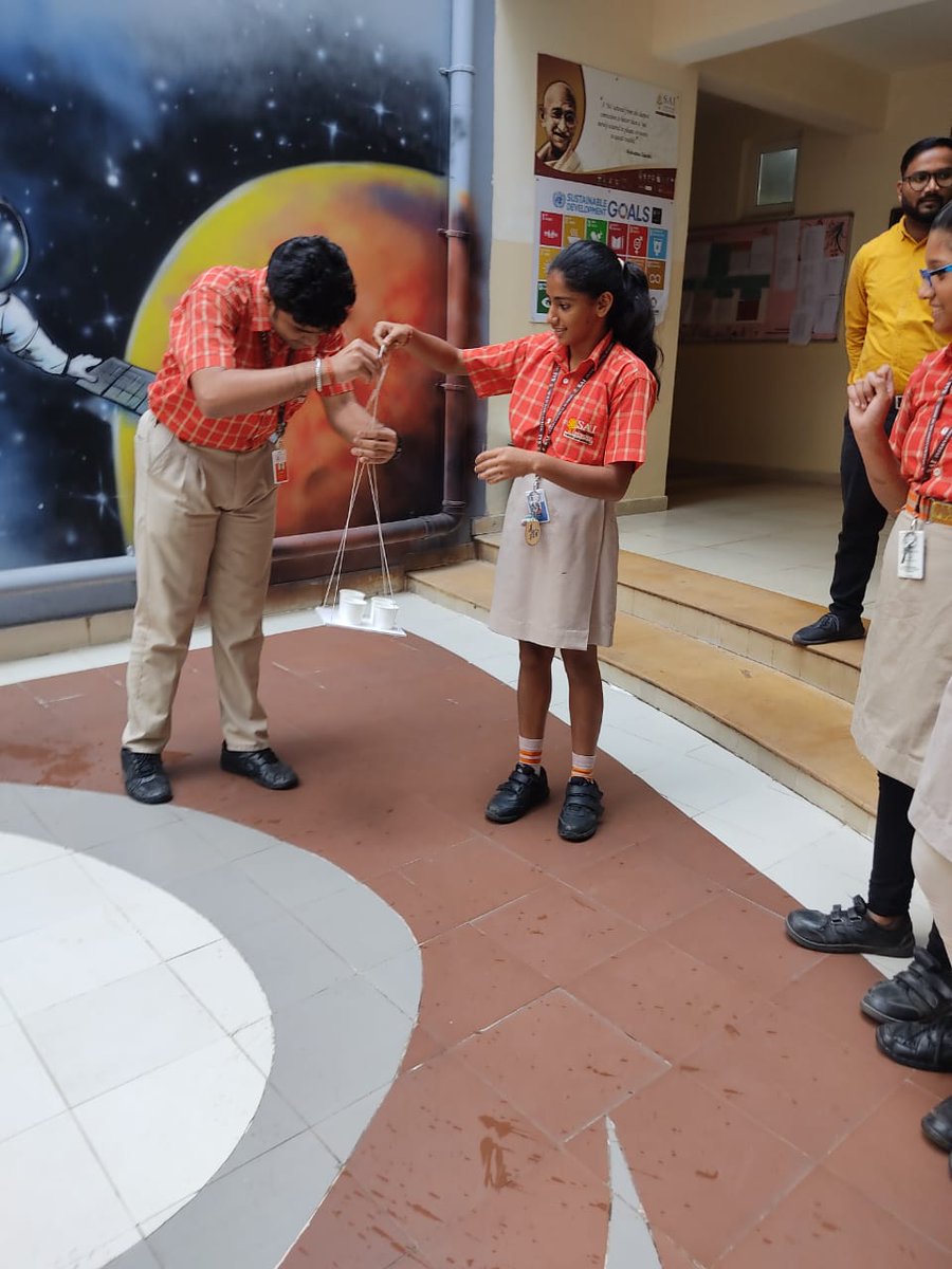SAI_Edu_In's tweet photo. Students of Classes VI-VIII engaged in a hands-on activity to demonstrate their understanding about centripetal force.

#Spectrumclub #Clubactivity #Inquirydrivenlearning
#EngagedLearners #Funlearning #Happyclassroom
#21stCenturyLearning https://t.co/QkiiW6Ka6B