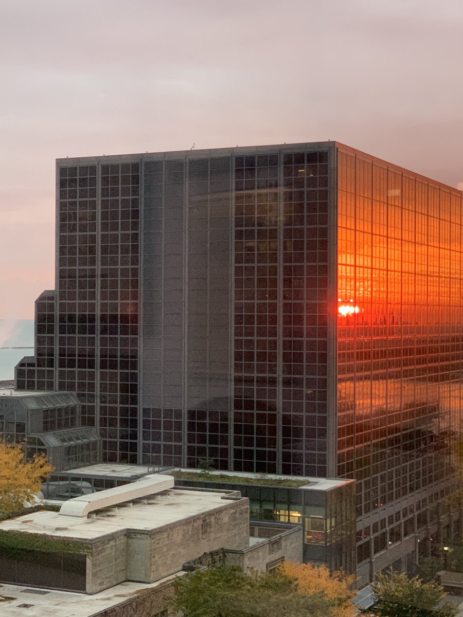 Can’t see the sunrise over Lake Michigan directly from my office, but when it reflects off the Rubloff building, it is spectacular. 🌞