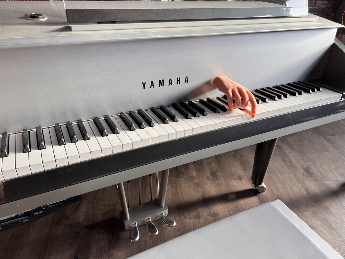 ThePianoGuys's tweet photo. The new piano tuner dropped by this morning... He's pretty 'handy' to have around.🤚

Happy Halloween from The Piano Guys! 🎃👻👹
#aadamsfamily #thing #halloween https://t.co/qwRGmAXVmp