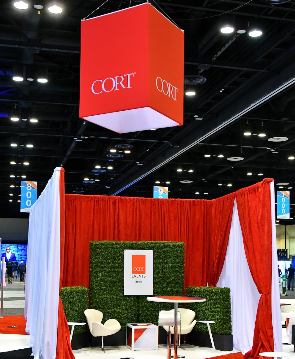 Infusing crimson hues into your events creates a bold, visionary space sure to spark lively conversations.