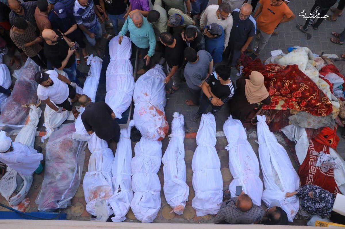 QudsNen's tweet photo. A holocaust! 

#Israel dropped 6 American highly destructive bombs, each of them weighing 1 ton, on one of the most heavily populated blocks in #Gaza. 
Jabalya refugee camp is only 1.4 square km, with nearly 60,000 citizens living in it. Most of the camp's houses are shanties.
This is how Israel defends itself!