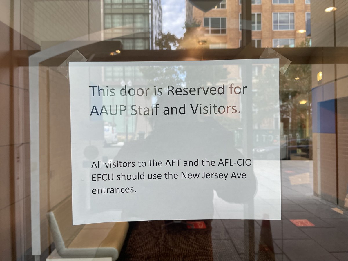us_aaup's tweet photo. Here is a sign posted at the AFT building, which houses the @aaup's DC office, establishing this as the sole entrance for AAUP staff, making every other entrance to the building a "neutral gate." A neutral gate is a picket-busting tactic, as we assume @imulvey knows. https://t.co/nI1dp1ZtJi