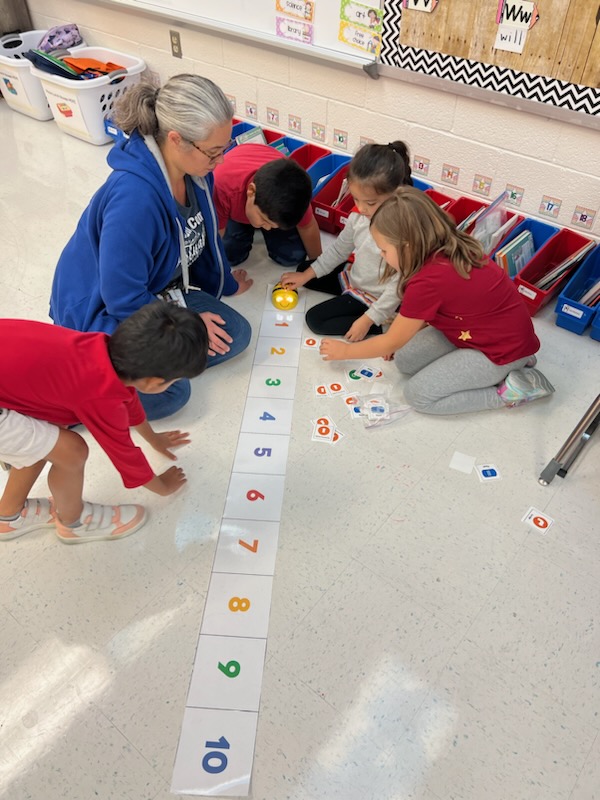 HRZIFT's tweet photo. Mrs. Yang's students learn and review numbers and letters with beebots. She said she saw her students become leaders, willing participants, cooperative and caring at a higher level than normally expected. She even had parents mentioning the beebots during conferences. I love it! https://t.co/M7OSTh4nZO