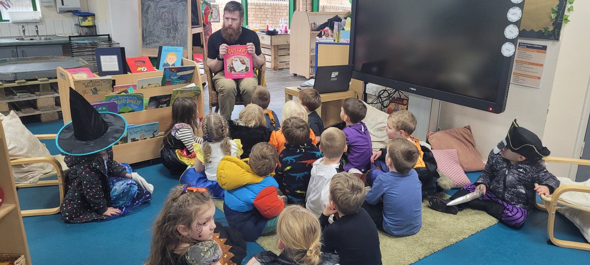 St_Benets's tweet photo. Thank you Mr Morris for coming in to read 2 spooky tales - they were brilliant stories and we love your storytelling 📖 101 Spooky Bums was very funny indeed 🤣🕸🧙‍♀️🕷🦇🖤🎃 https://t.co/vBQImEjDec