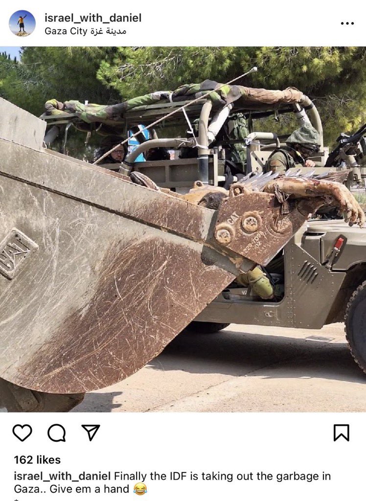 An Israeli is bragging about an Israeli bulldozer carrying dead Palestinians. 

Nazi Zionists!!!