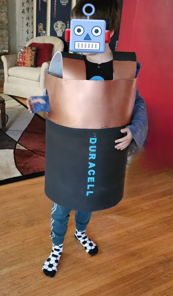 This year, the,GrandBoy wanted to be a Duracell battery. Shout-out to the salesfolk at @MichaelsStores Pittsford NY who helped me decide on the infrastructure: cosplay foam wrapped around 2 recycled plastic wreath bases. The letters=glow-in-the-dark. #HappyHalloween