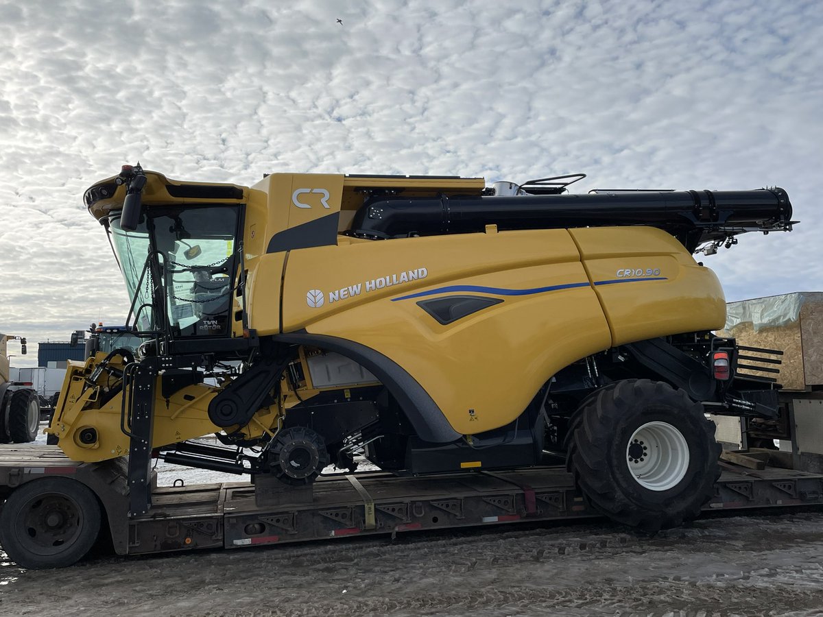 CR9090JK's tweet photo. First look for me of the Model Year 2024 CR combine. Just arrived in our yard for the local Ag Show next week. All new decals for next year among a few other changes. 
#yellowcombines https://t.co/3NqffYUpNZ