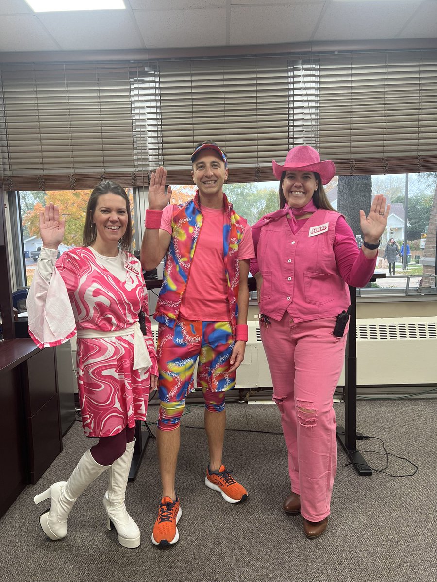 Hi, Barbie! Hi, Ken!                                 Happy Halloween from the Elmwood Office Team! 🩷