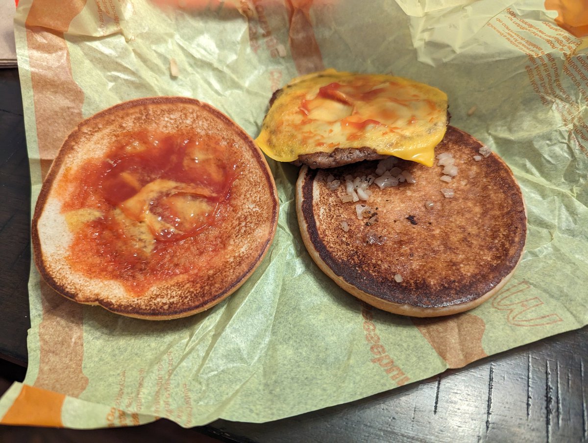 T_revW's tweet photo. @McDonaldsCanada no more pickles on my cheeseburger (I used to get two...), onion pieces the size or sand, and the overall diameter has shrunk considerably... And somehow, even with all this inflation, you post record profits this past quarter... Something isn't right here... https://t.co/fi9z9287d1