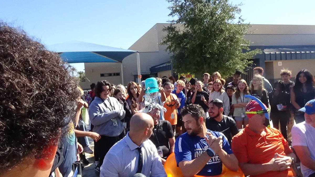Students had a lot of fun engaged in the fundraiser for the 8th-grade trip by drenching their teachers with water:)

GO TROJANS
