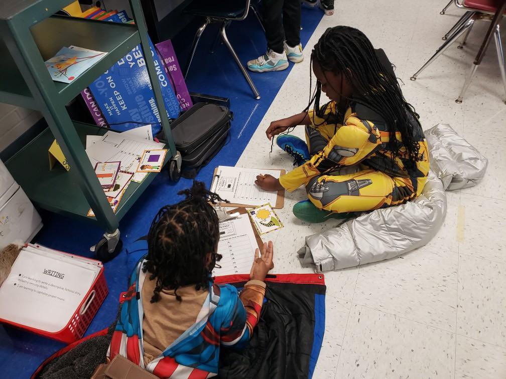 Armstrong_HSD's tweet photo. Mrs. Session's class working cooperatively on our Halloween stations to extend our learning in reading and math. #EaglePride🦅 #theSTRONG 💪🏽 https://t.co/B1fSs06rmQ