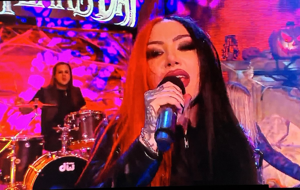 Fun fact: Ash Costello of New Years Day, who are currently performing on NXT? 

She sang Rhea Ripley’s old song “Brutality”