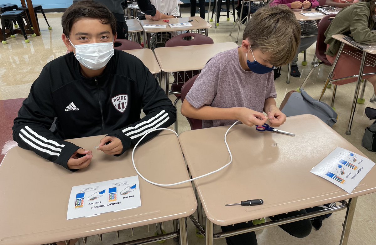 CWMS_office's tweet image. On Friday, some seniors from Mrs. Thomaschek’s Cisco Academy class came to the Algebra classes to work with our students and talk about the class. They taught them how to make Ethernet Cables. #CWway #CWMSchangemakers