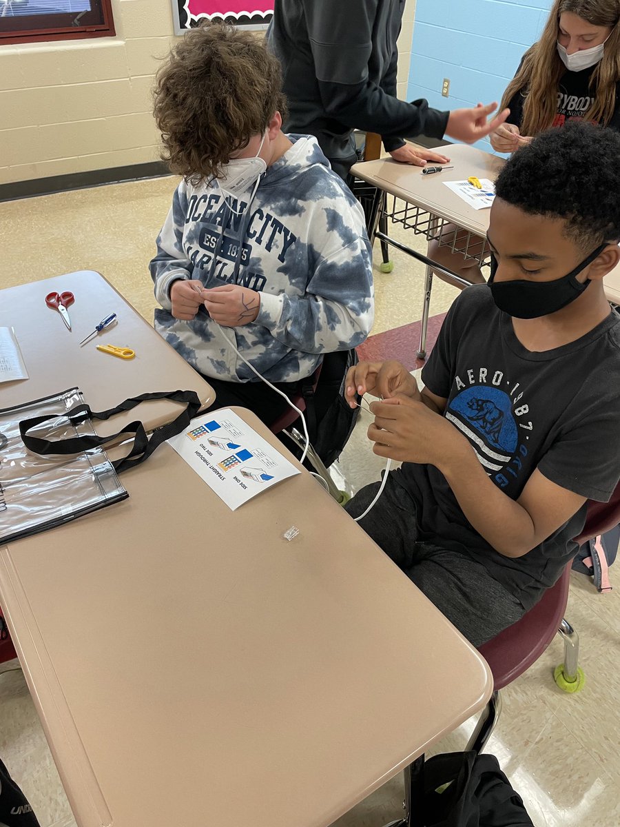 CWMS_office's tweet image. On Friday, some seniors from Mrs. Thomaschek’s Cisco Academy class came to the Algebra classes to work with our students and talk about the class. They taught them how to make Ethernet Cables. #CWway #CWMSchangemakers