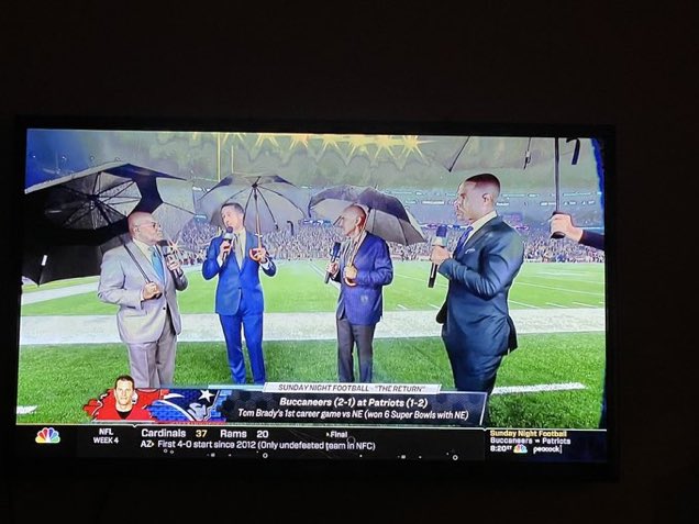 susancrist's tweet photo. #nfl did Rodney Harrison hire Puff Daddy’s umbrella holder? https://t.co/h7JzRf3lZK