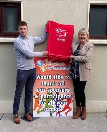 Delighted to be main sponsor the Virginias' Cancer fund mini marathon. Jersey's being presented to Mary Reilly by Tim Flood of BD Flood