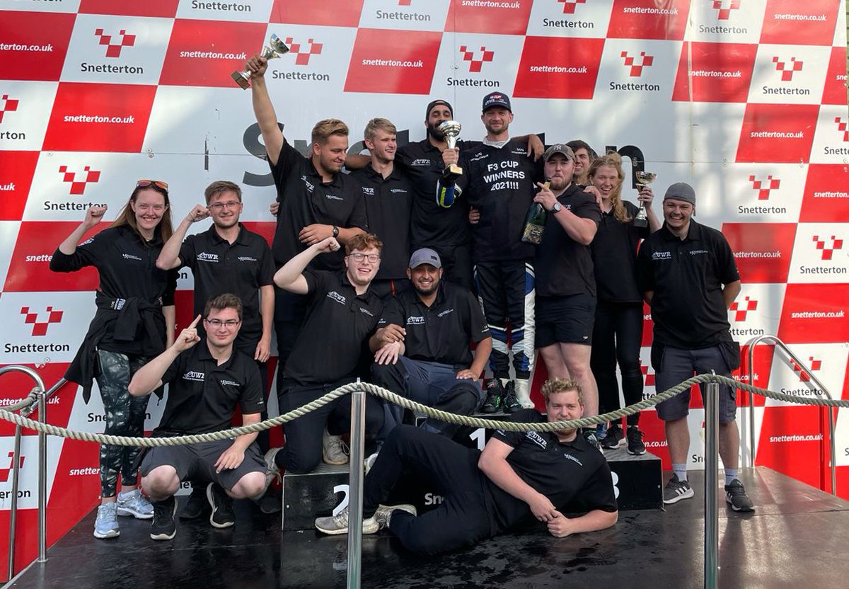 's tweet image. Cheers, celebrations and a 'shoey'! Read the round-up of @UWRacing  championship-winning day at Snetterton &amp;gt;&amp;gt; bit.ly/3uFes4v 🏎👟🍾

#mtorosport #f3cup #champions #students #education @wlv_uni
