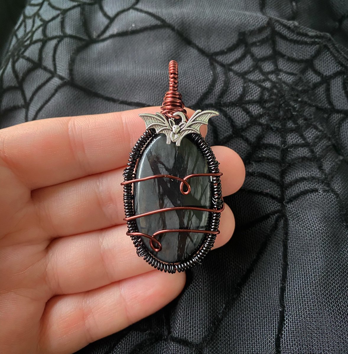 soulful_wraps's tweet photo. Picasso Jasper wrapped in mahogany red &amp; black wires featuring a bat charm 
Available this Friday 10/8 at 6pm EST on my website 
https://t.co/nojryT5PGW
Part of the Grimacing Graveyard Collection 
🕸☠️🕷🪦 https://t.co/ltElAlLlwI