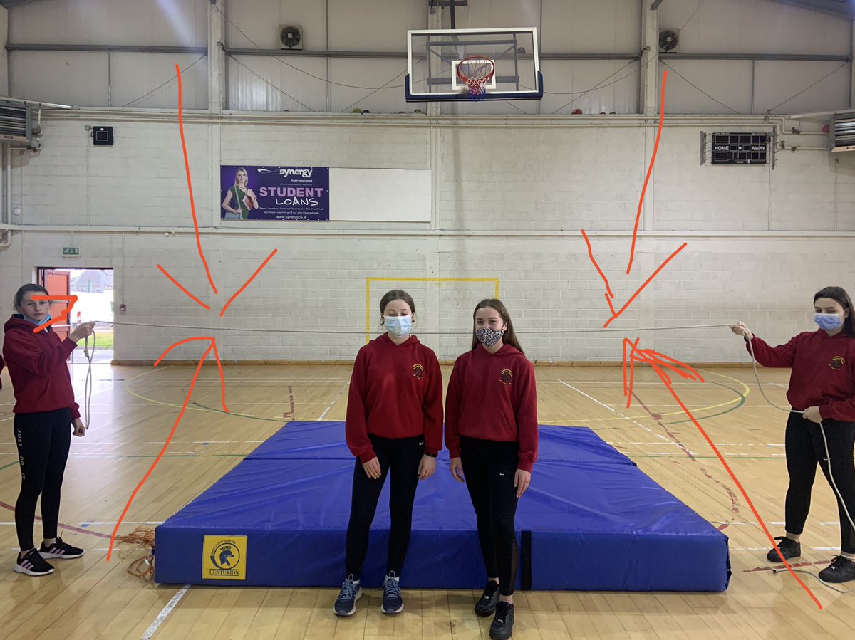 FermoyPe's tweet photo. Our 2 winners of the high jump. Check out the rope between the arrows for the height they jumped!! #FosburyFlop #highjump #athletics #pe #loreto https://t.co/YNkknKM90X