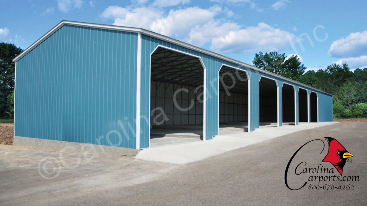 Beautiful in Blue! Don't you just love this six-car garage? 😍 #cci #carolinacarports #qualityisourfirstpriority #garage #garages #metalgarage #metalgarages #steelgarage #steelgarages #garagelife #storage #installers #installation #building #buildings