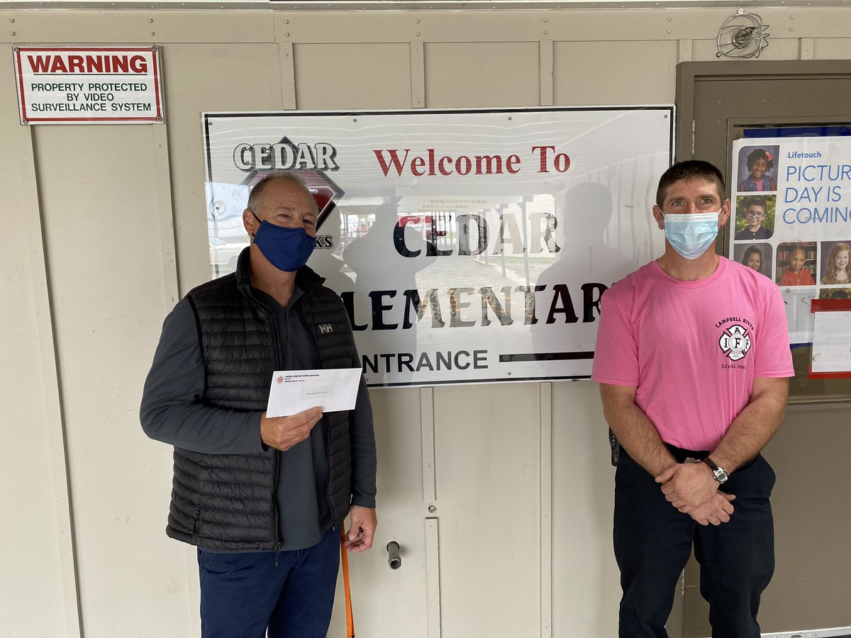 Local 1668 making a $1000 donation to the Cedar Elementary School Hot Lunch Program.