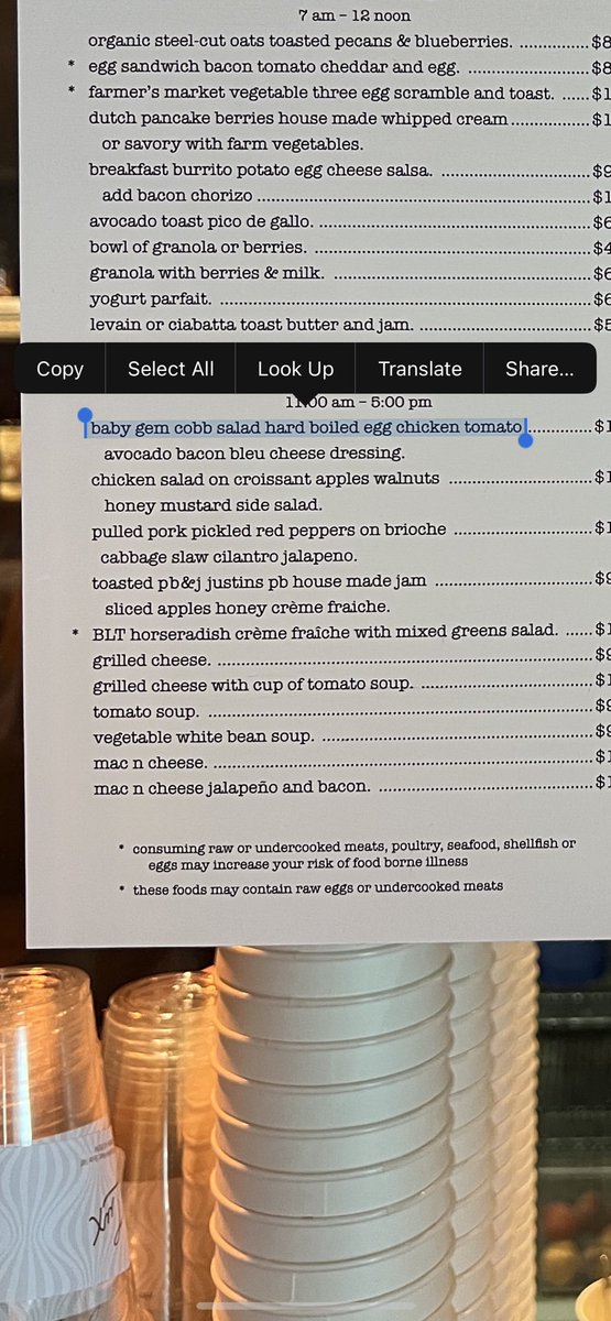 Am I late to the party? Just discovered the OCR feature in iPhoto app on iOS. You can tap and hold on text in an image to copy and paste it, translate, or look up