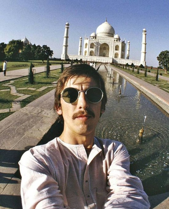 George Harrison taking a selfie at the Taj Mahal in 1966.