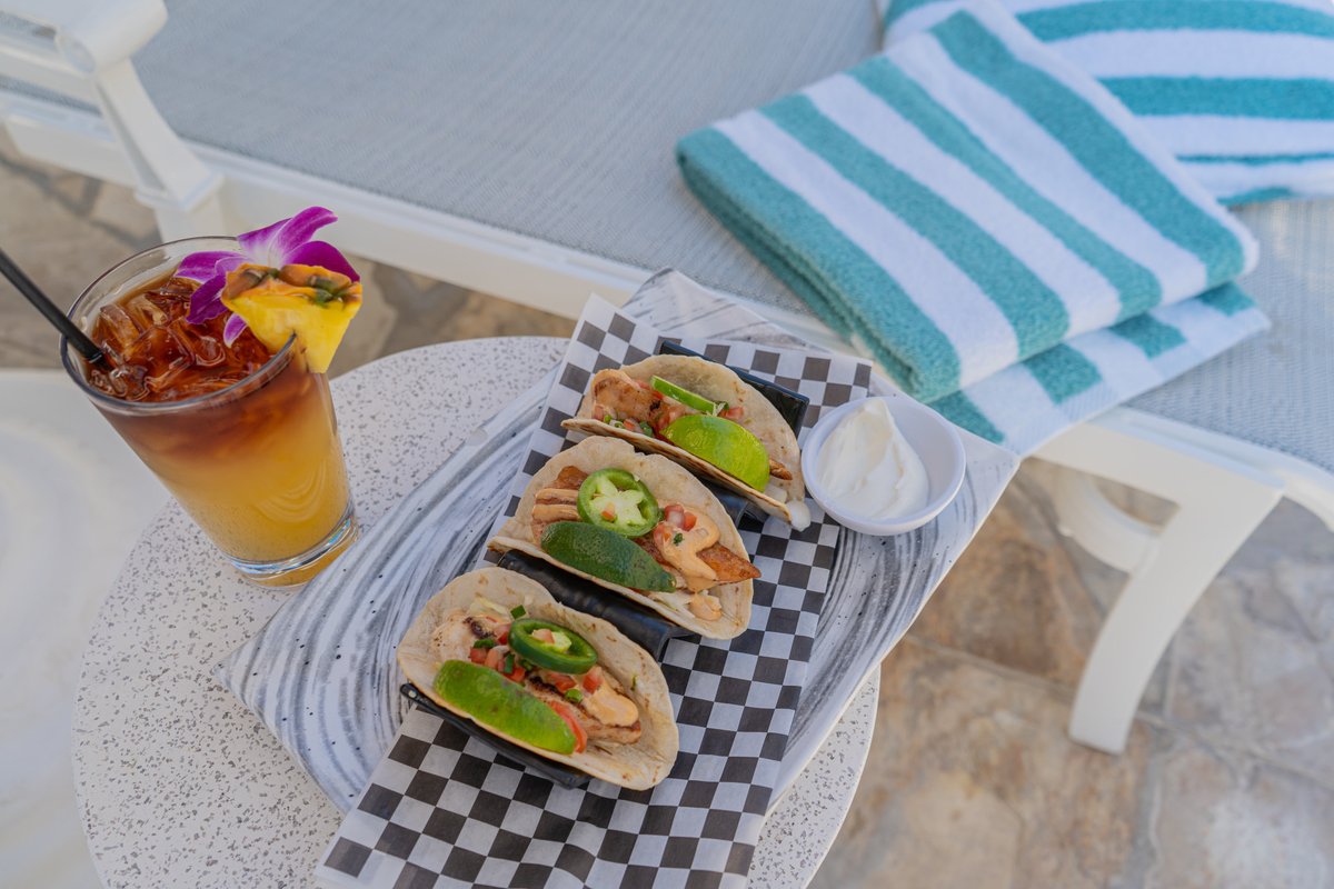 Happy National Taco Day 🌮! We’re serving it up Hawai‘i-style with Fresh Catch Tacos with Asian slaw and lomi lomi tomatoes. #NationalTacoDay #OutriggerReef