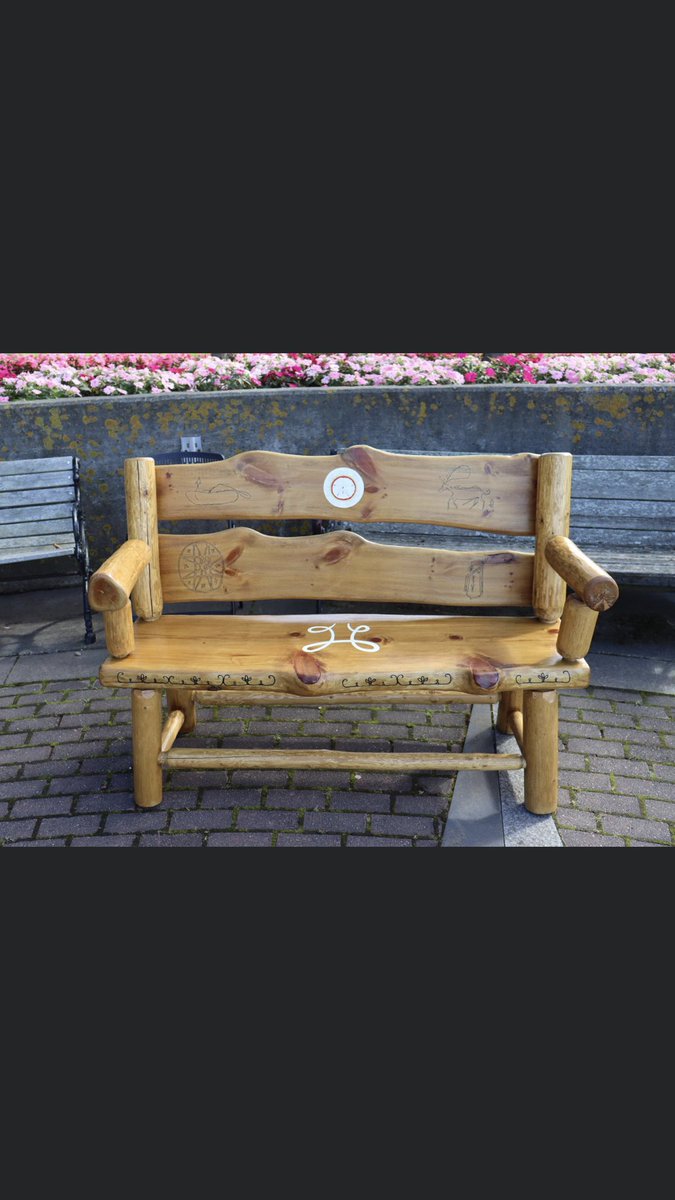 This beautiful handmade Mi'kmaw Friendship Bench, was built &amp; donated by local craftsman James Colquhoun. Mi'kmaw artist Ed Benham added hieroglyphs and petroglyphs &amp; Acadia First Nation emblem. The bench’s permanent home is Frost Park @TownOfYarmouth #TruthAndReconciliation