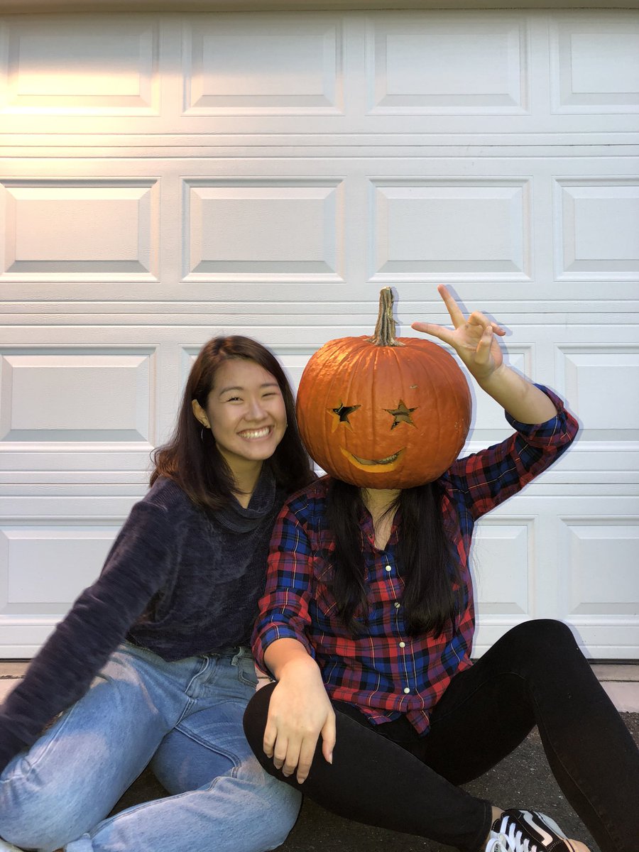 hypebina's tweet photo. nice lil throwback to last year when my sister tried breaking my neck by stuffing my head into this pumpkin 🎃 happy spooky szn y’all https://t.co/wcHs86Mnxa