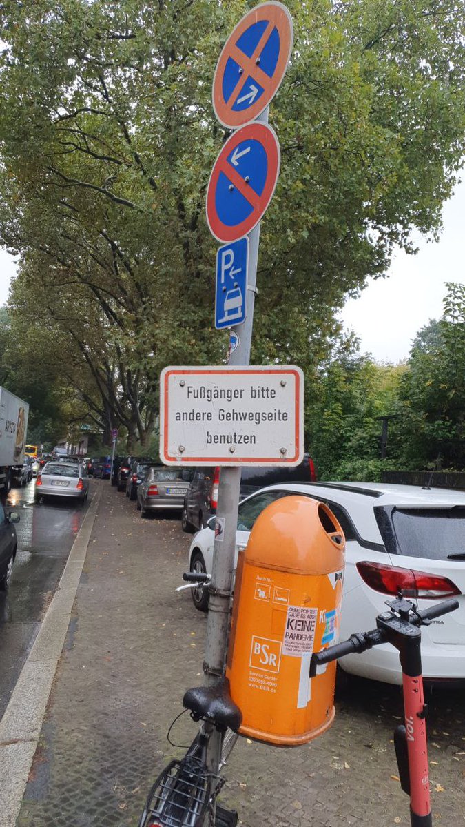 PPchef's tweet photo. Absolute capitulation: because so many cars park on the sidewalk, Berlin hung up a sign for pedestrians: walk on the other side. 

#AtLeastTheySaidPlease https://t.co/sDfRhTGh1G