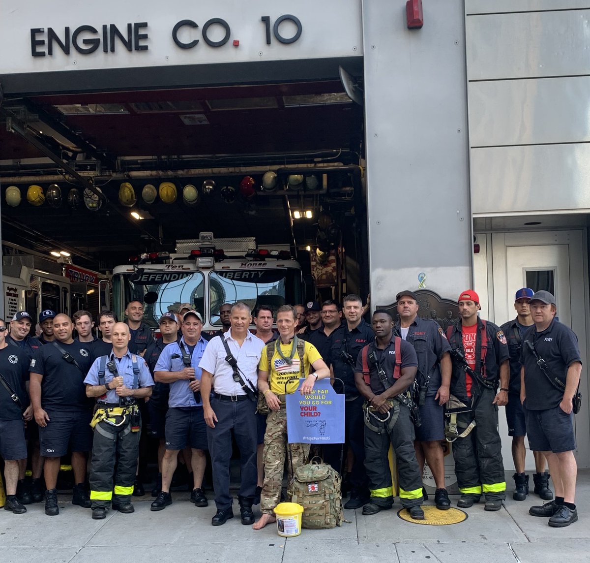FDNY's tweet image. On Saturday, September 25, FDNY #Engine10 #Ladder10 greeted British Army Officer, Major Chris Brannigan, who was embarking on a 1200-mile barefoot walk to bring awareness to the Cornelia de Lange syndrome (CDLS) charity, Hope for Hasti. Read more: bit.ly/3uG7FYn