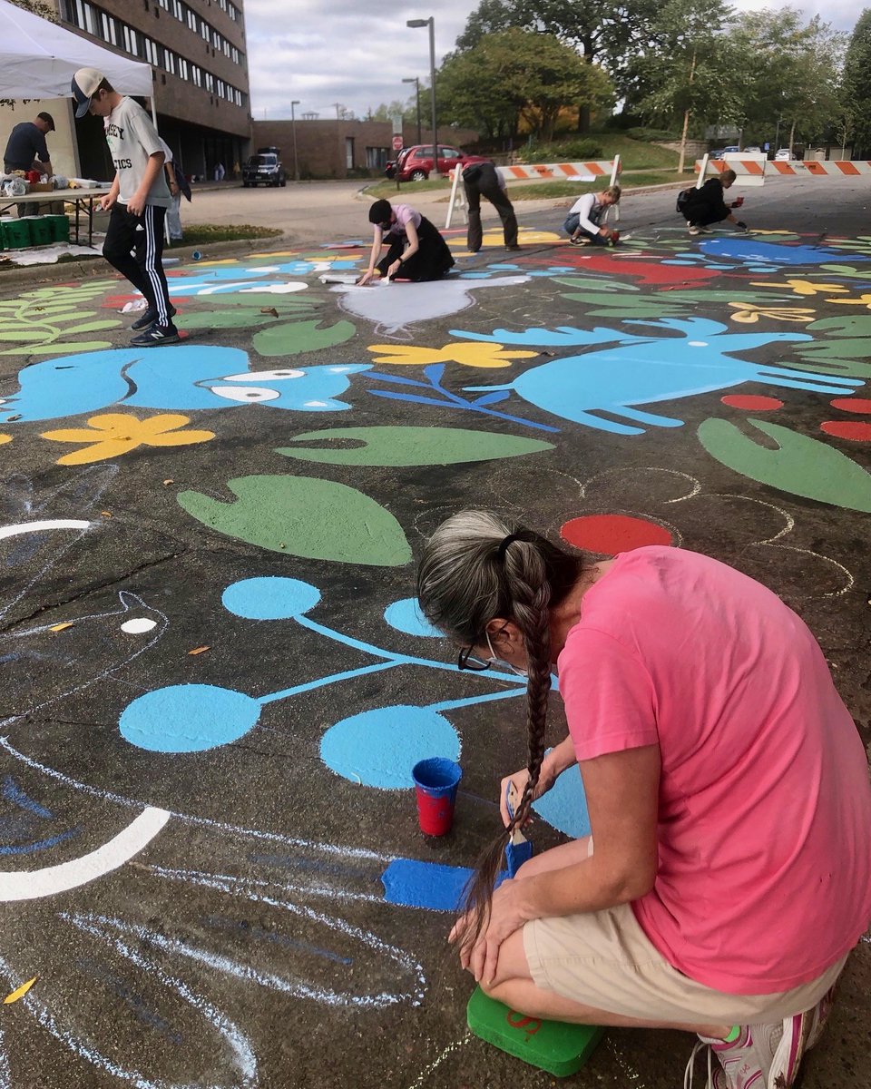 transitionasap1's tweet photo. Neighbors painted the street outside Seal Hi-Rise Saturday, led by artist Kada Goalen. See it at Seal and Territorial, where a new sidewalk improves access to Raymond Station. Thanks to the Transportation Committee of the St. Anthony Park Community Council and an AARP grant. https://t.co/nAJWJavxXJ