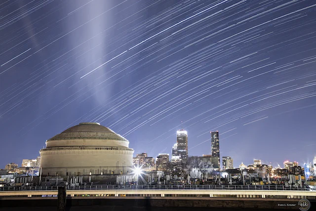 Stars streak over the sky over the MIT great dome