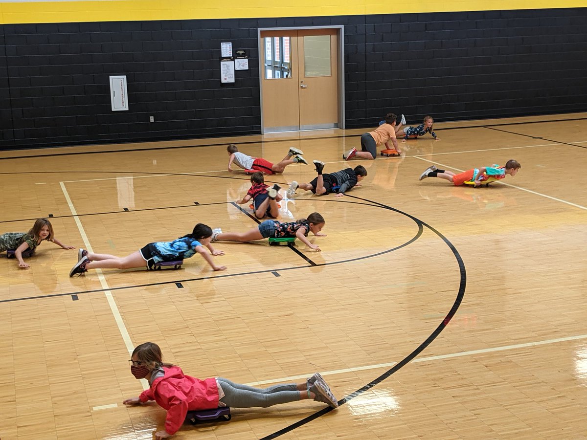 Mrs. Walker's 3rd graders are enjoying an oldie, but goodie today in P.E. class, here at Three Rivers Elementary. Scooter play helps refine and develop muscular strength in their upper and lower bodies.