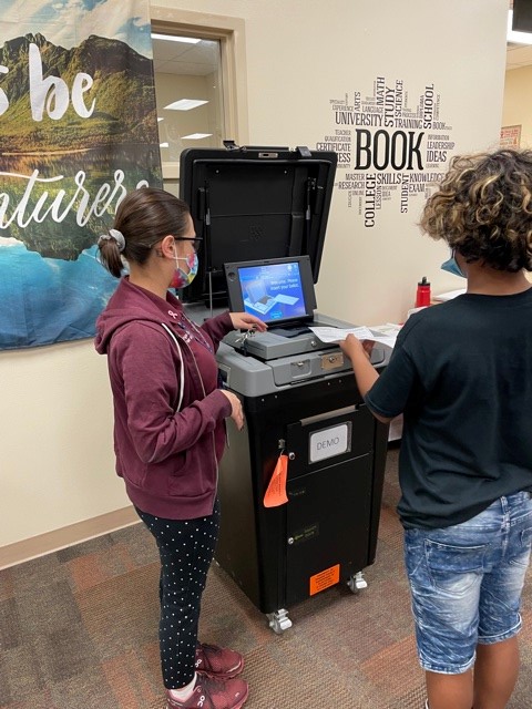 LegacyMS_OCPS's tweet photo. It's National Voter Education Week! Students in their Civics class heard a presentation from the @OCFElections office and participated in a mock election. https://t.co/l2jqjc2bzy