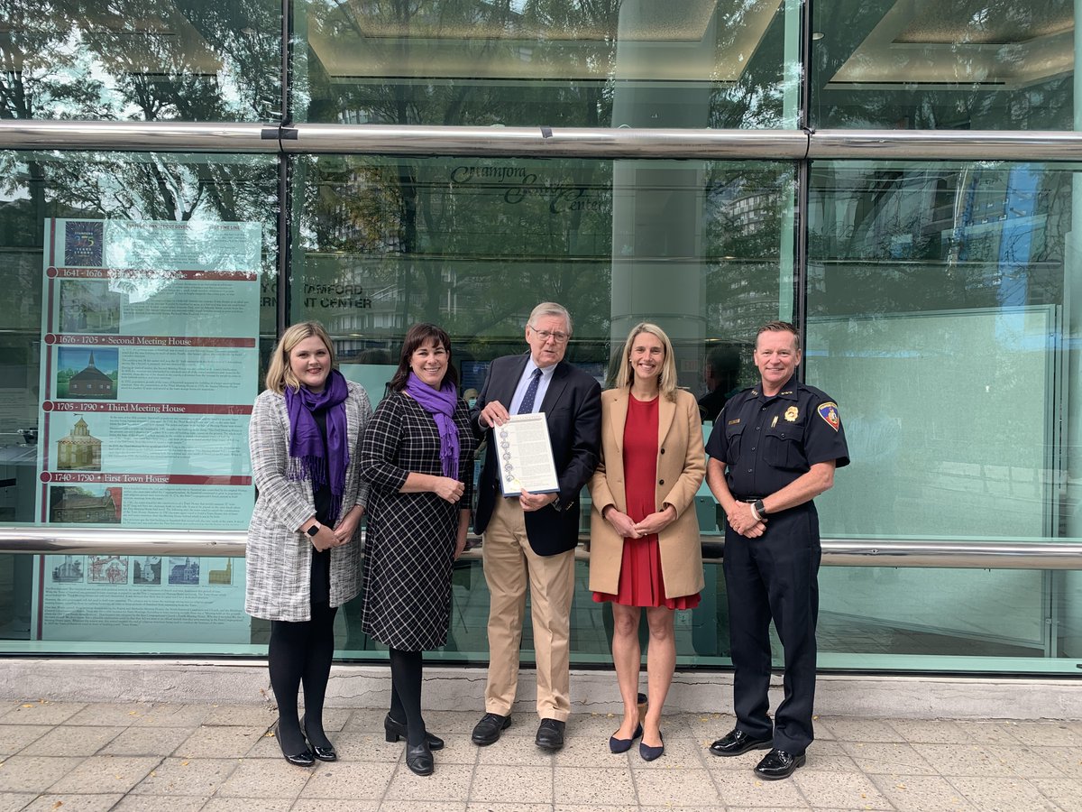 DVCCCT's tweet photo. Stamford Mayor David Martin delivered a proclamation this afternoon at Government Center for Domestic Violence Awareness Month. State Rep. Caroline Simmons, Stamford PD Chief Timothy Shaw, and DVCC’s Executive Director, Suzanne Adam spoke at the program. #DVAM #Every1KnowsSome1 https://t.co/0T7Bm1zwBj