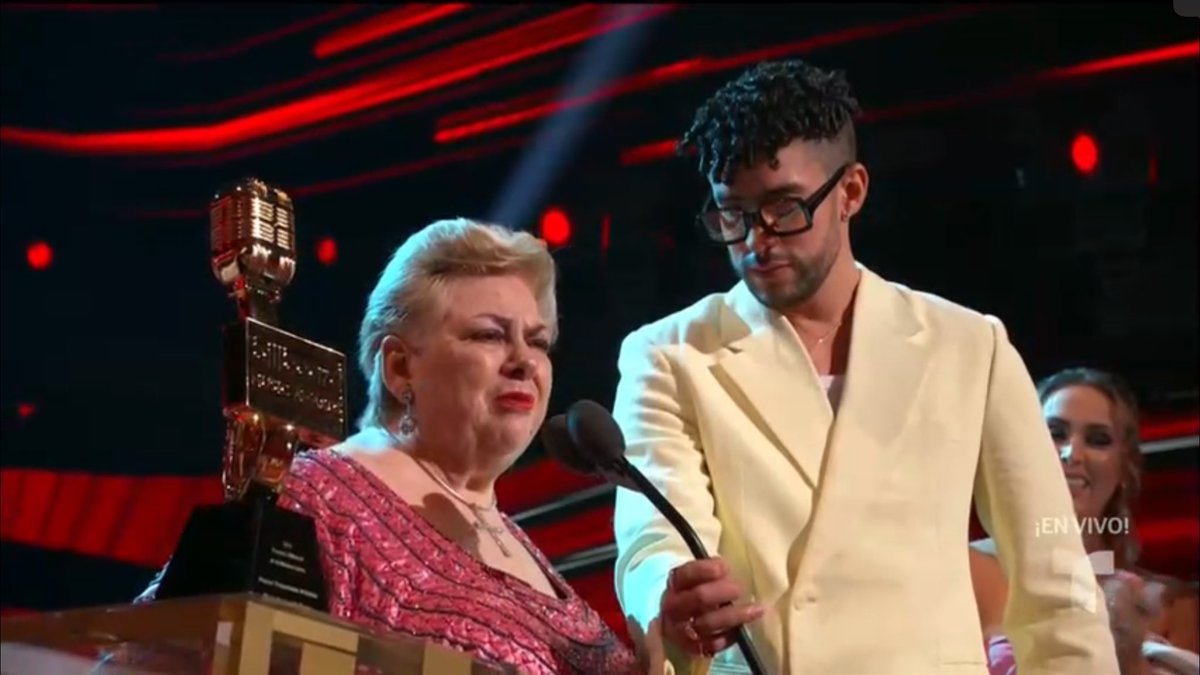 PopBase's tweet photo. Bad Bunny helped Paquita la del Barrio to the Latin BBMAs stage and held the microphone while she accepted her Lifetime Achievement Award. 🤍 #Billboards2021 https://t.co/jR8DBXrOkP