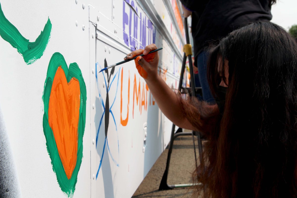 ColtonJUSD's tweet photo. Students at @SMHS_CJUSD lent their talent to the Transportation and @CJUSDStudentSvc departments' 2021 Kindness Bus project this week. We can't wait to see it spread its message of love and unity through the streets of #CJUSD for Unity Day on Oct. 20! #CJUSDCares https://t.co/8wLD1yhY4M