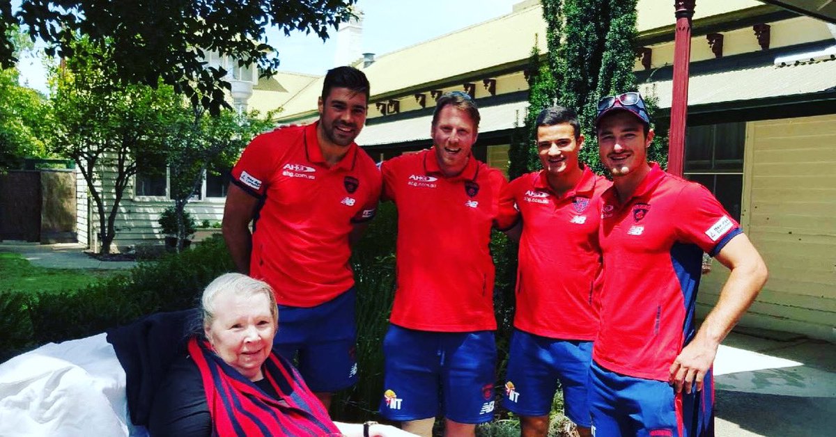 MattBurgan's tweet photo. 2015-18: The launch of Melbourne logo (2015), my late Mum about six months before she passed meeting Dawes, Stretch and Neal-Bullen (2016), a fan boy pic with Indigenous Melbourne stars (2017) and before final match with Dees - the 2018 prelim with Matty Goodrope. #GiveEmHell https://t.co/2quYpxOhgw