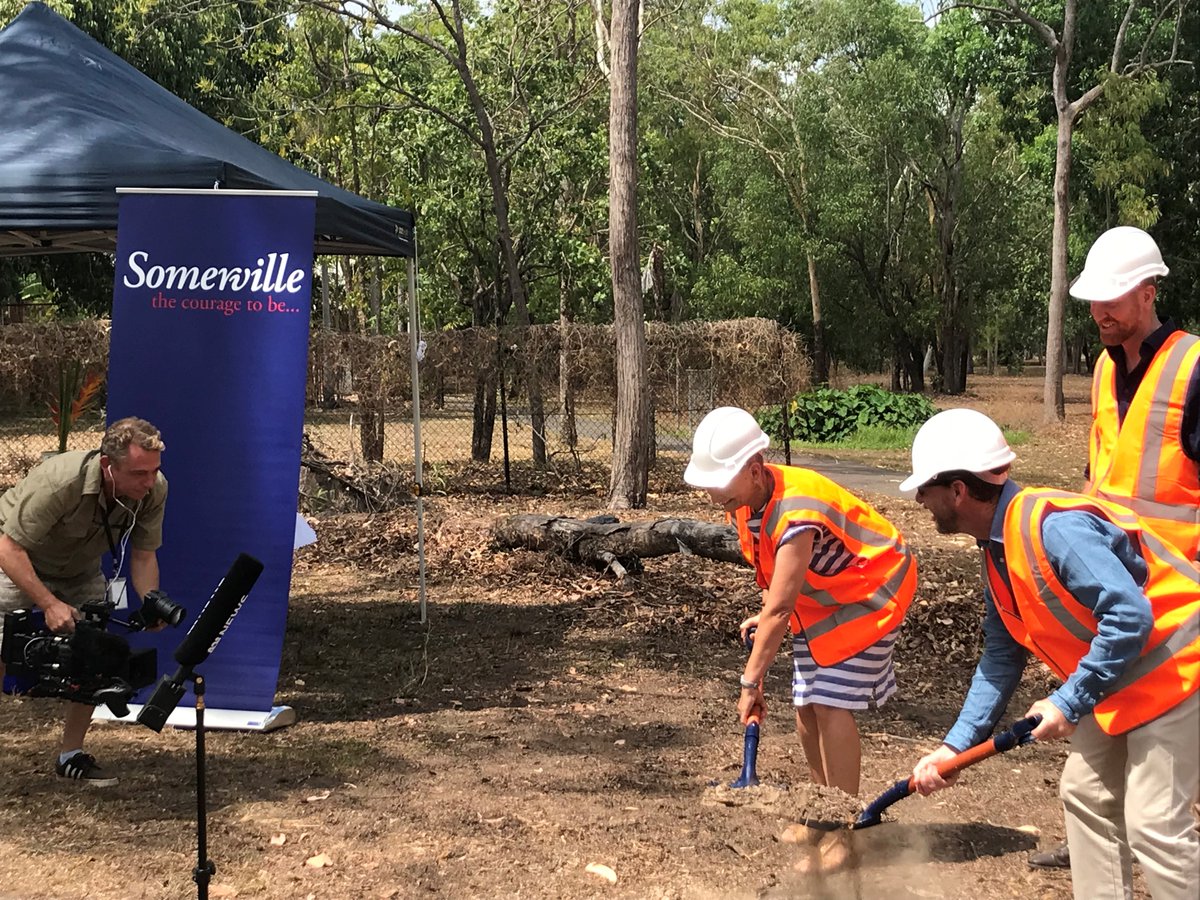 NTShelterInc's tweet photo. Bring out the shovels! NT Disabilities Minister Kate Worden gets her hands dirty as @SomervilleCS unveils plans to build two high quality, @TroppoArchitect designed Specialist Disability Accommodation properties in Palmerston NT. #ntpol https://t.co/5AucvKMdts
