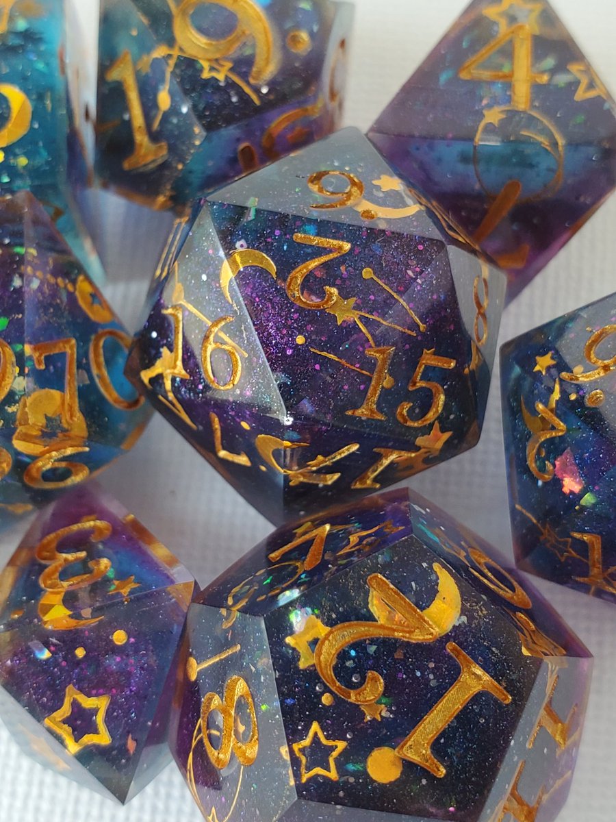 CritCandyDice's tweet photo. Astromancer, a sweet star themed set that I'm delighted with the results of. #resindice #dice #dnddice #ttrpgdice #sharpdice https://t.co/od53wyskHZ