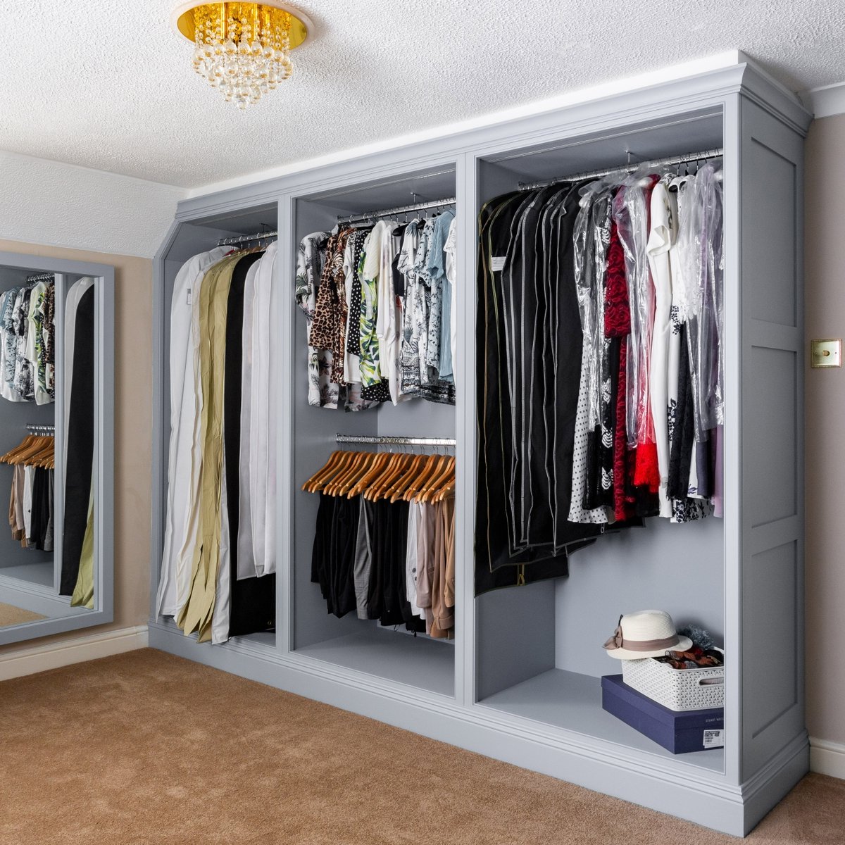 This dressing room had a sloped ceiling meaning an off-the-shelf solution wouldn't have been suitable; by choosing to go bespoke, our retail showroom partner was able to scribe the wardrobe to the sloped ceiling for a seamless fit. #ArborLaneInteriors #bespoketradefurniture