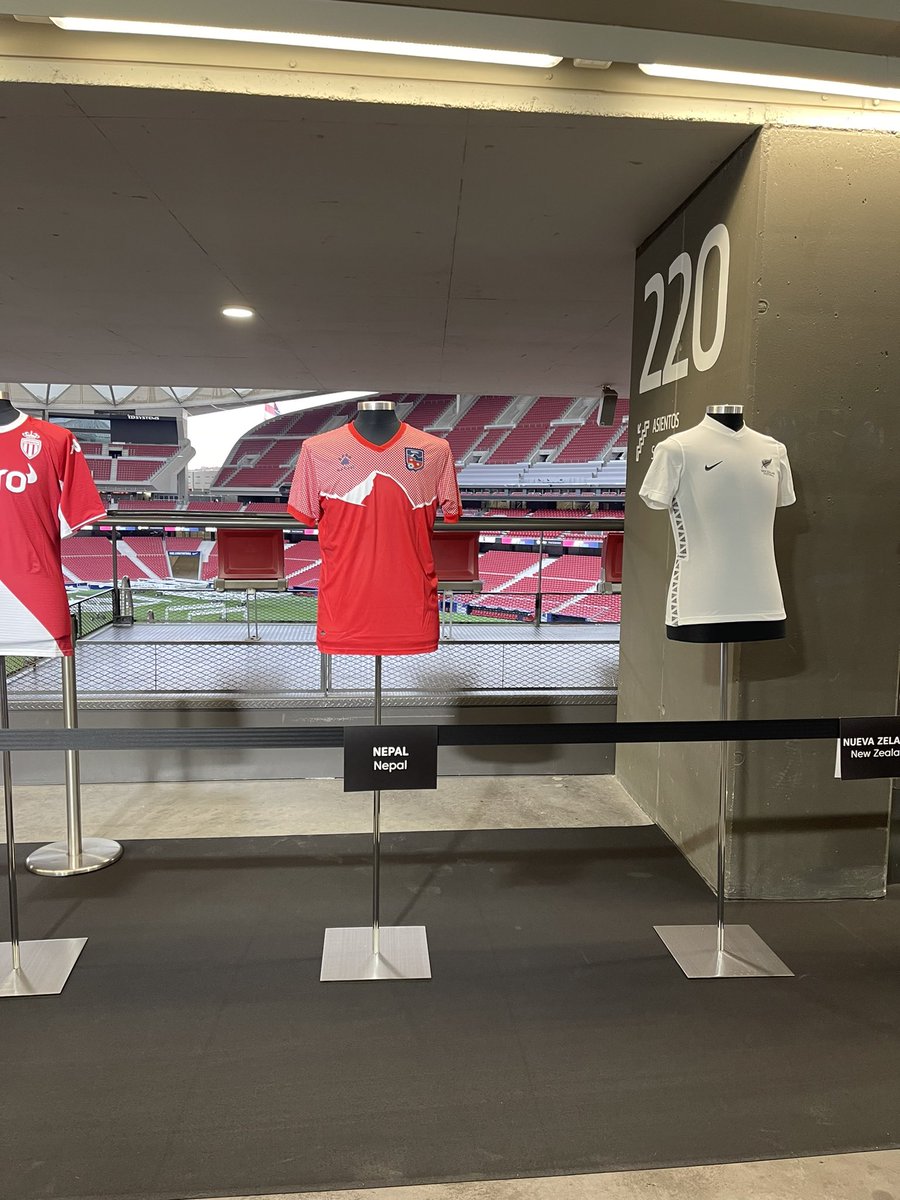 EoNMadrid's tweet photo. The Official Jersey of 🇳🇵National Football team was proudly on display, at the Fútbal por la Paz exhibition at Wanda Metropolitano Stadium, home of the Atletico Madrid on 22nd Sept. 80 other countries took part in the event to celebrate how sports connect people and communities. https://t.co/AKBg3fCpui