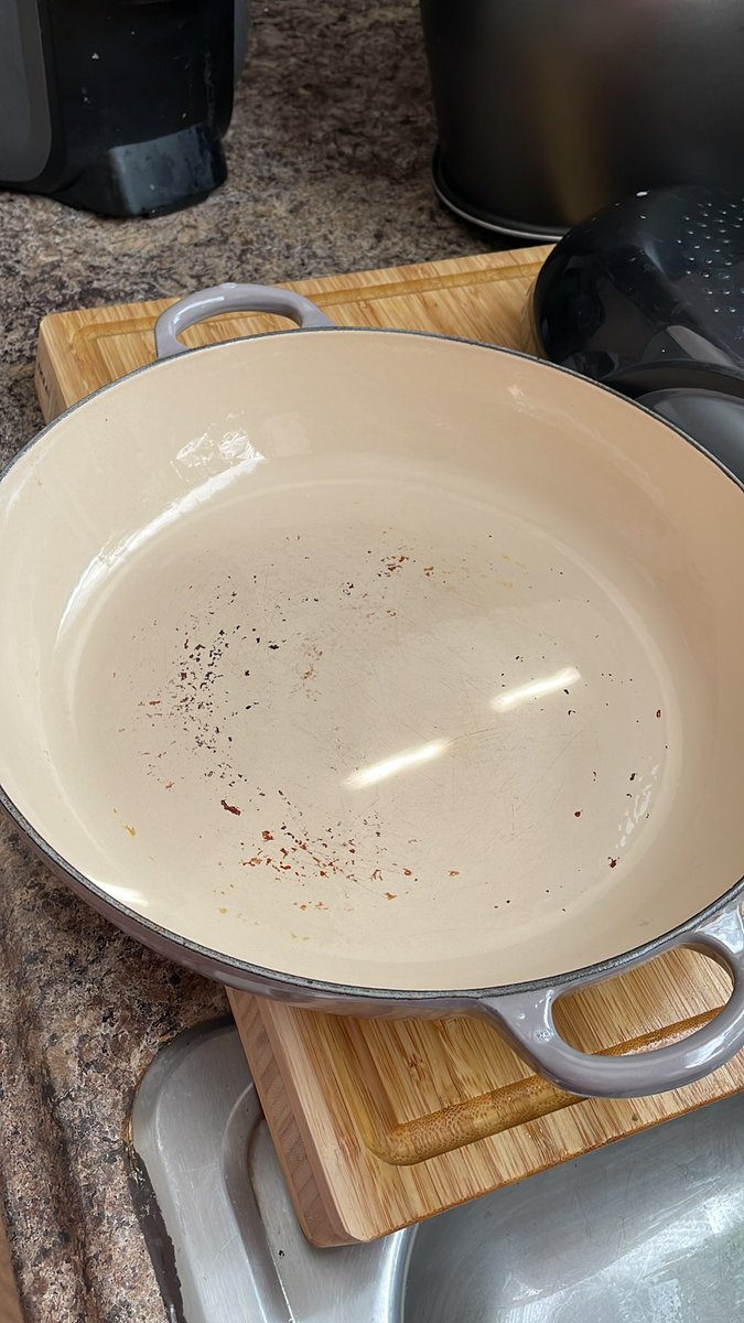 carginochavez's tweet photo. @lecreuset legit question, is this normal(see photo)? I warm up at medium for about 10 mins and oil it up with grapeseed oil. But it will usually darken after cooking and cleaning is super hard! Only way to clean it well is with good ol’ elbow grease. But it can take about 30 min https://t.co/kz9zDkCIkK