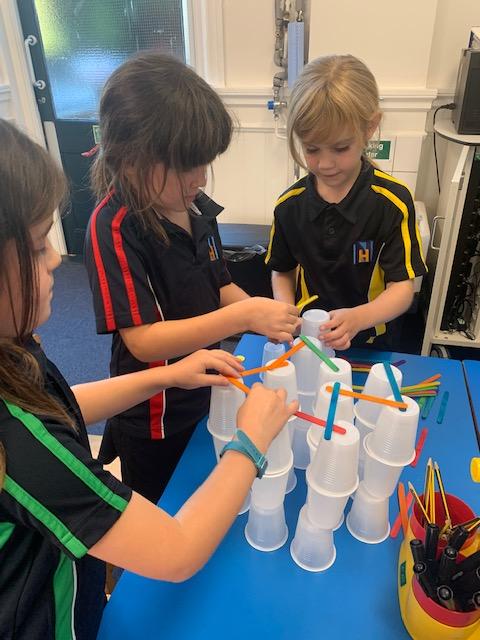NorfolkHouseSch's tweet photo. Form 2 had a wonderful afternoon taking part in a STEAM challenge  they had to build the tallest tower that would hold an apple, using the equipment provided. They had to work as a team, collaborating and sharing ideas. #nhcollaborate https://t.co/dUMIGSD4EB