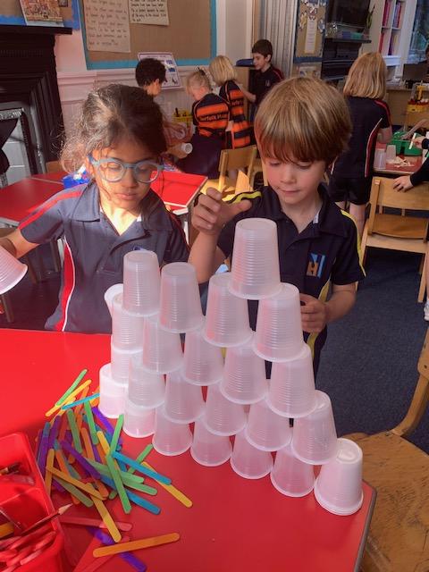 NorfolkHouseSch's tweet photo. Form 2 had a wonderful afternoon taking part in a STEAM challenge  they had to build the tallest tower that would hold an apple, using the equipment provided. They had to work as a team, collaborating and sharing ideas. #nhcollaborate https://t.co/dUMIGSD4EB