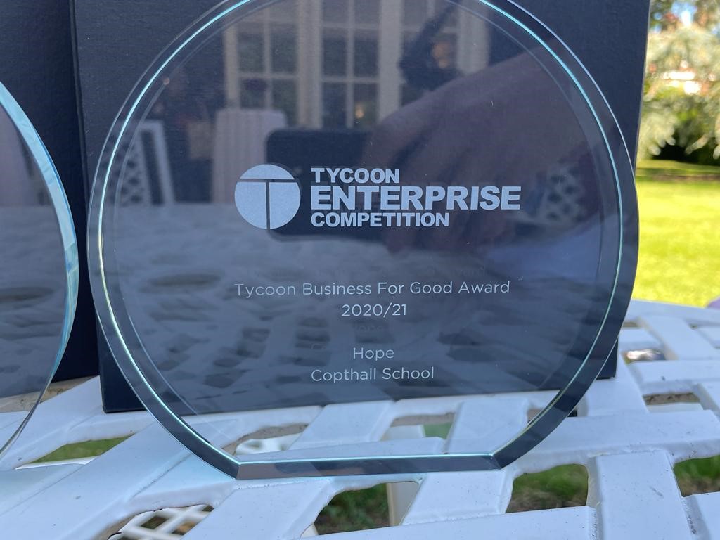 Copthall_School's tweet photo. They did it! @HopeCopthall made @dragonjones of @PJFoundation speechless with their determination, resilience and business drive. For the second time, our school brings home the trophies for #TycoonsinSchools. Winners of the #Tycoons1K AND #TycoonBusinessforGood awards. https://t.co/PnHHiZwtog