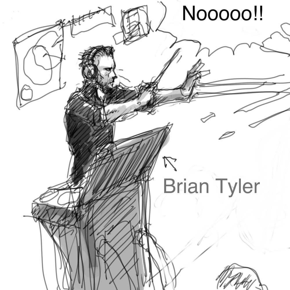 Ironman3の曲の収録中に間違えた演奏家に罰を与えるBrian Tyler氏。何か周囲にホログラフの計器のようなものが浮かんでいる。 