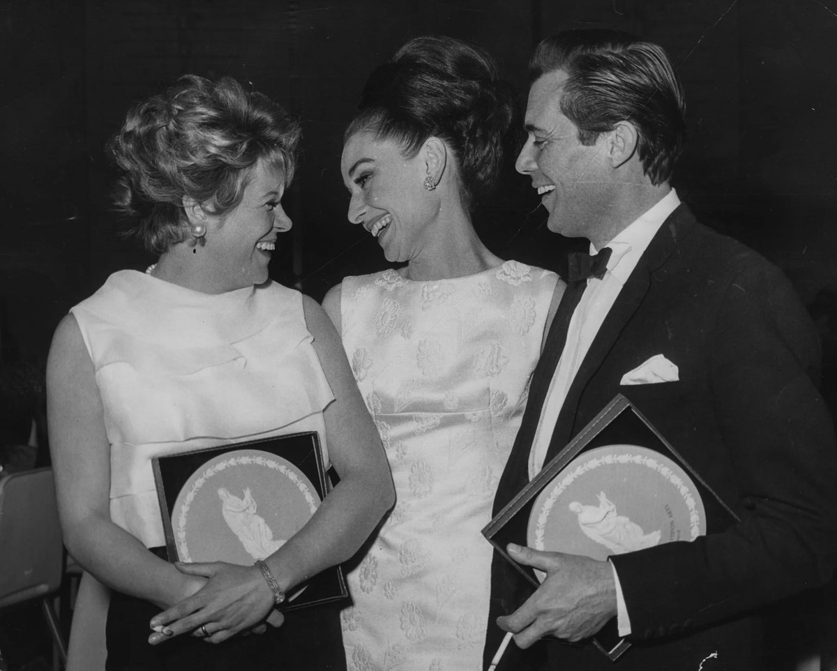dirkcomfort's tweet photo. Dirk with Audrey Hepburn and Rachel Roberts at the 1964 BAFTAs https://t.co/TrtbruZjvO